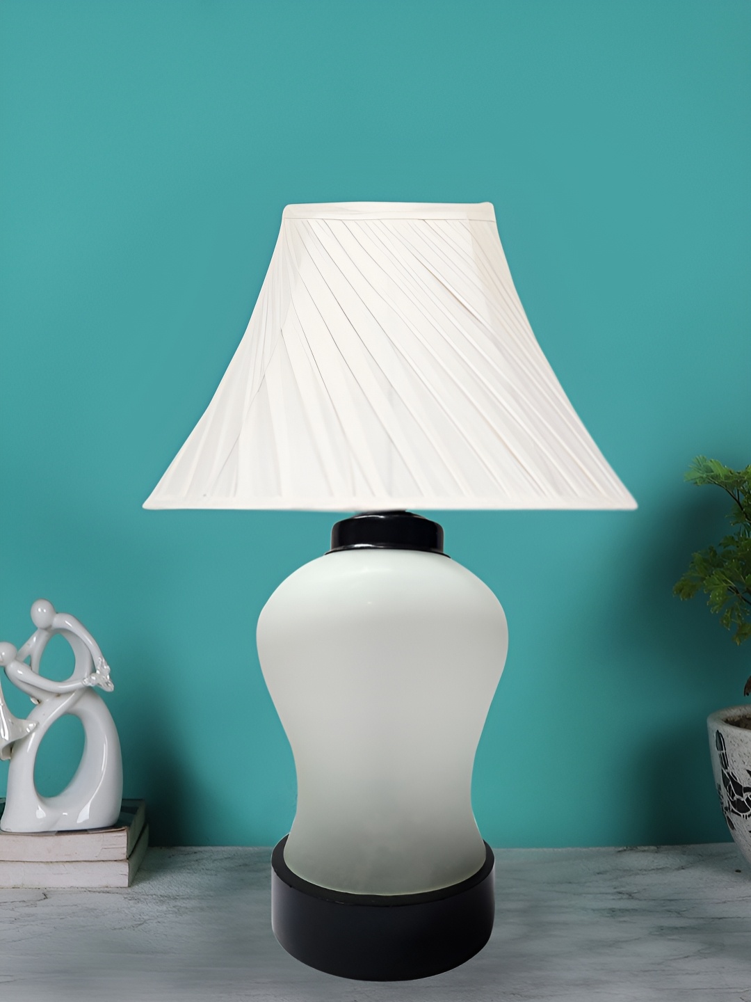 

Devansh Off White Glass Traditional Frusturical Shaped Table Lamp