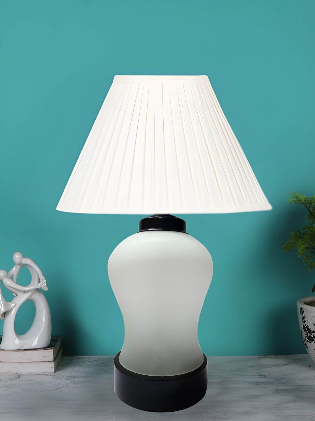 

Devansh Off White Glass Traditional Frusturical Shaped Table Lamp