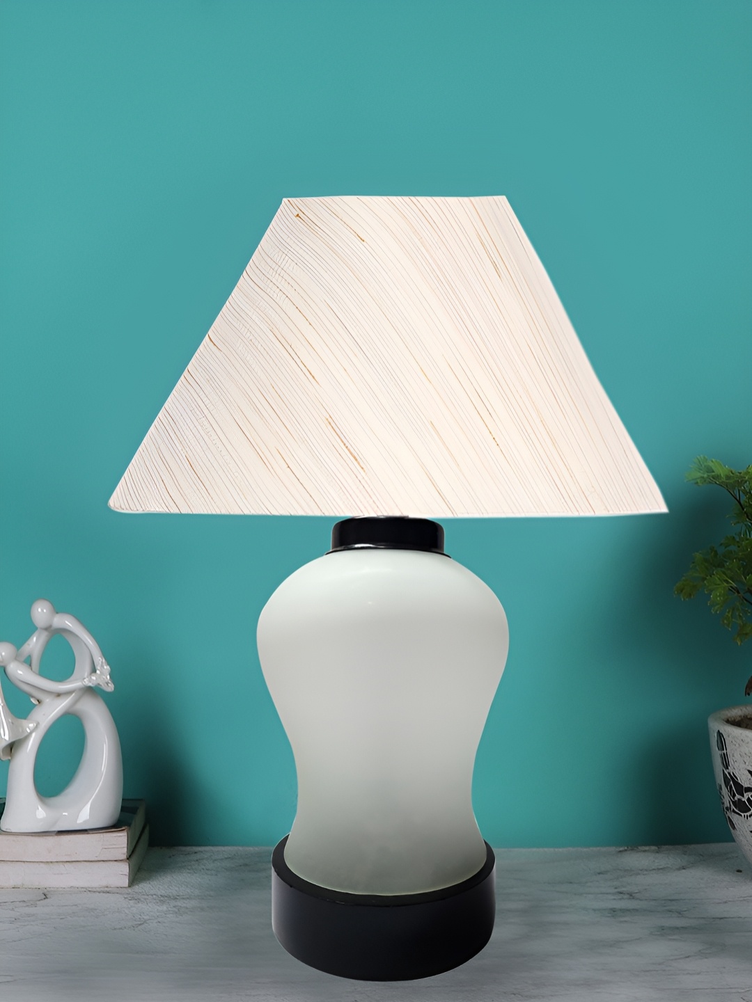 

Devansh Off White Glass Traditional Frusturical Shaped Table Lamp