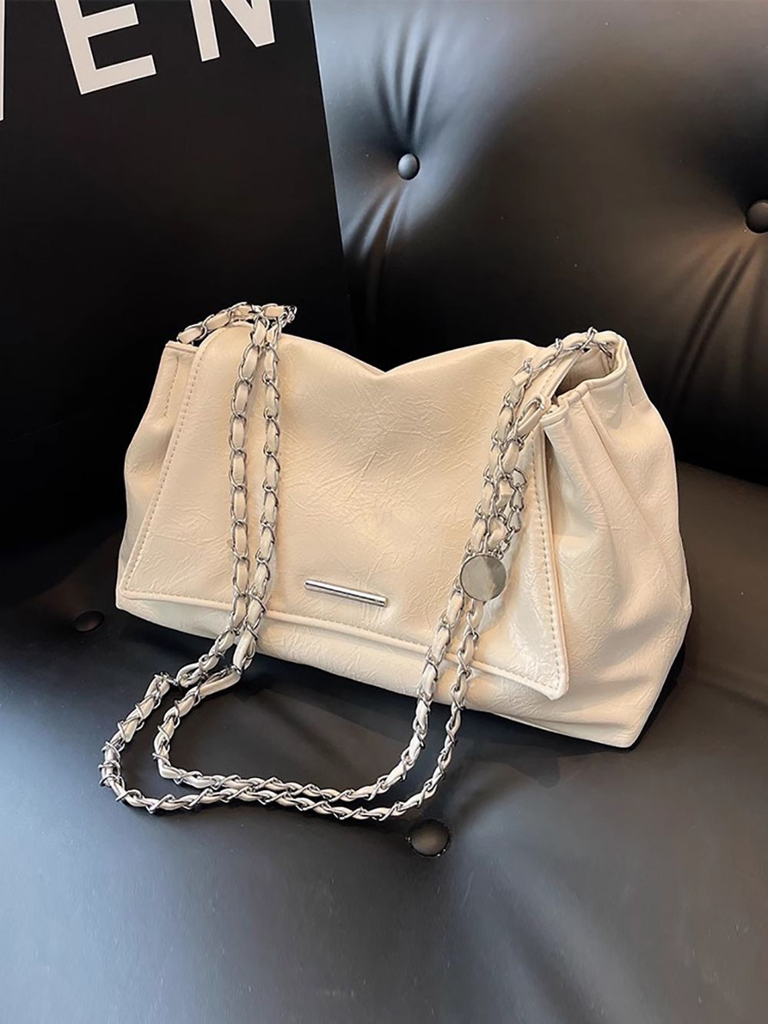 

StyleCast x Revolte PU Swagger Sling Bag, White