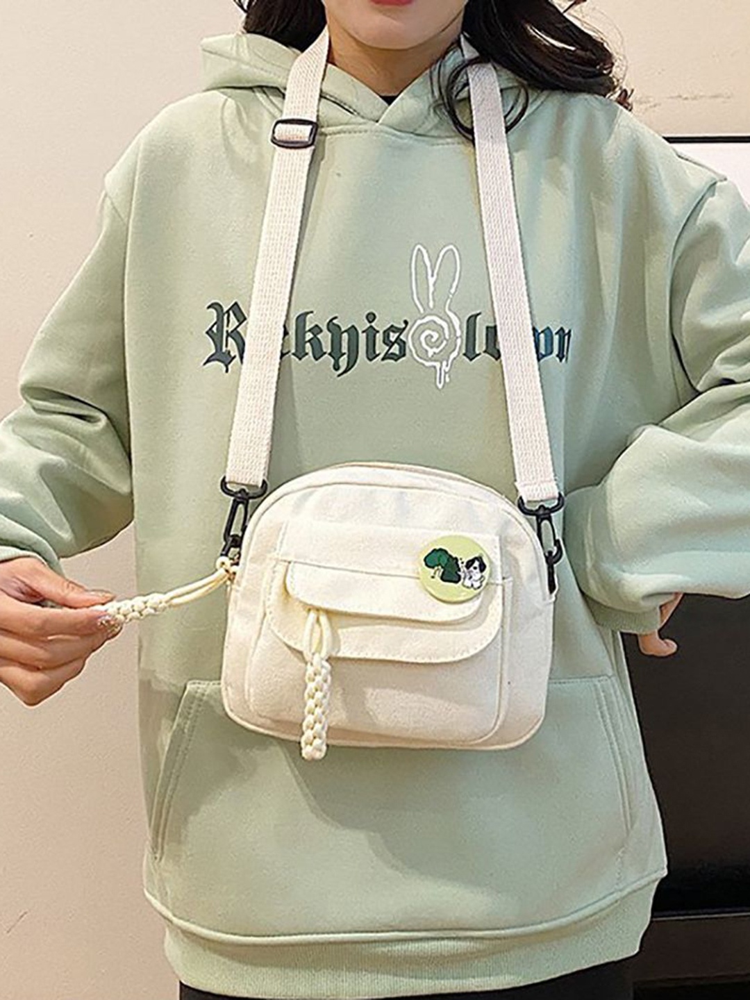 

StyleCast x Revolte Swagger Sling Bag, White