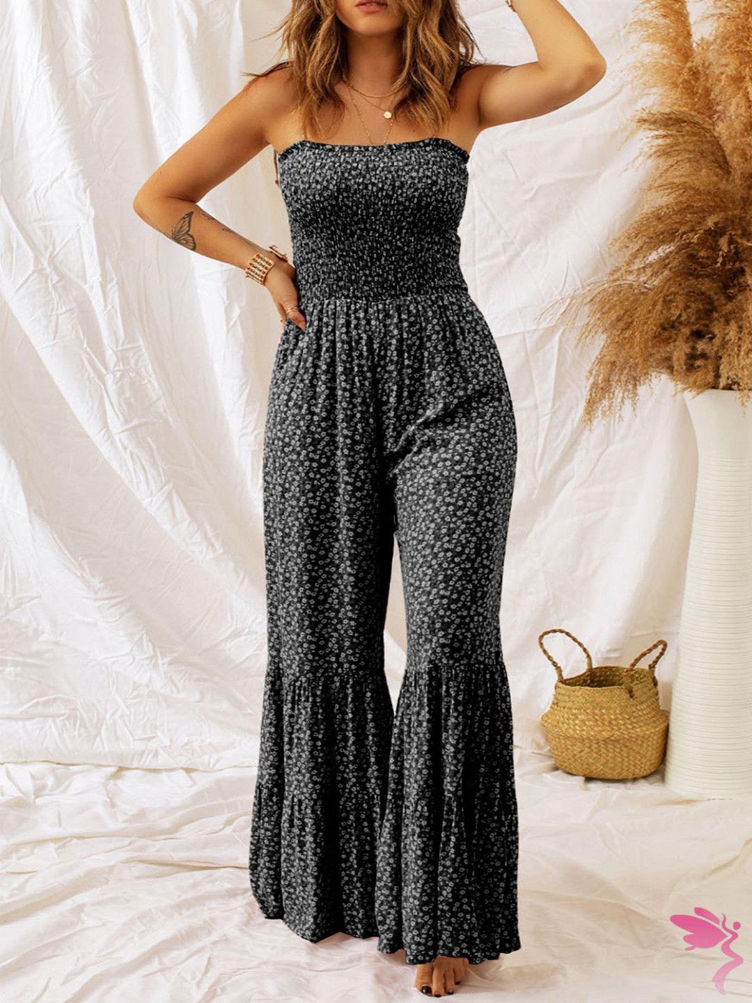 

StyleCast Women Printed Sleeveless Basic Jumpsuit, Black