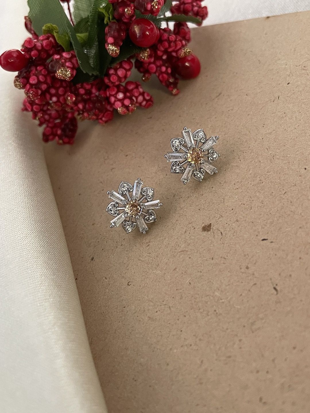 

Digital Dress Room Silver-Plated White AD-Studded Floral Studs Earrings