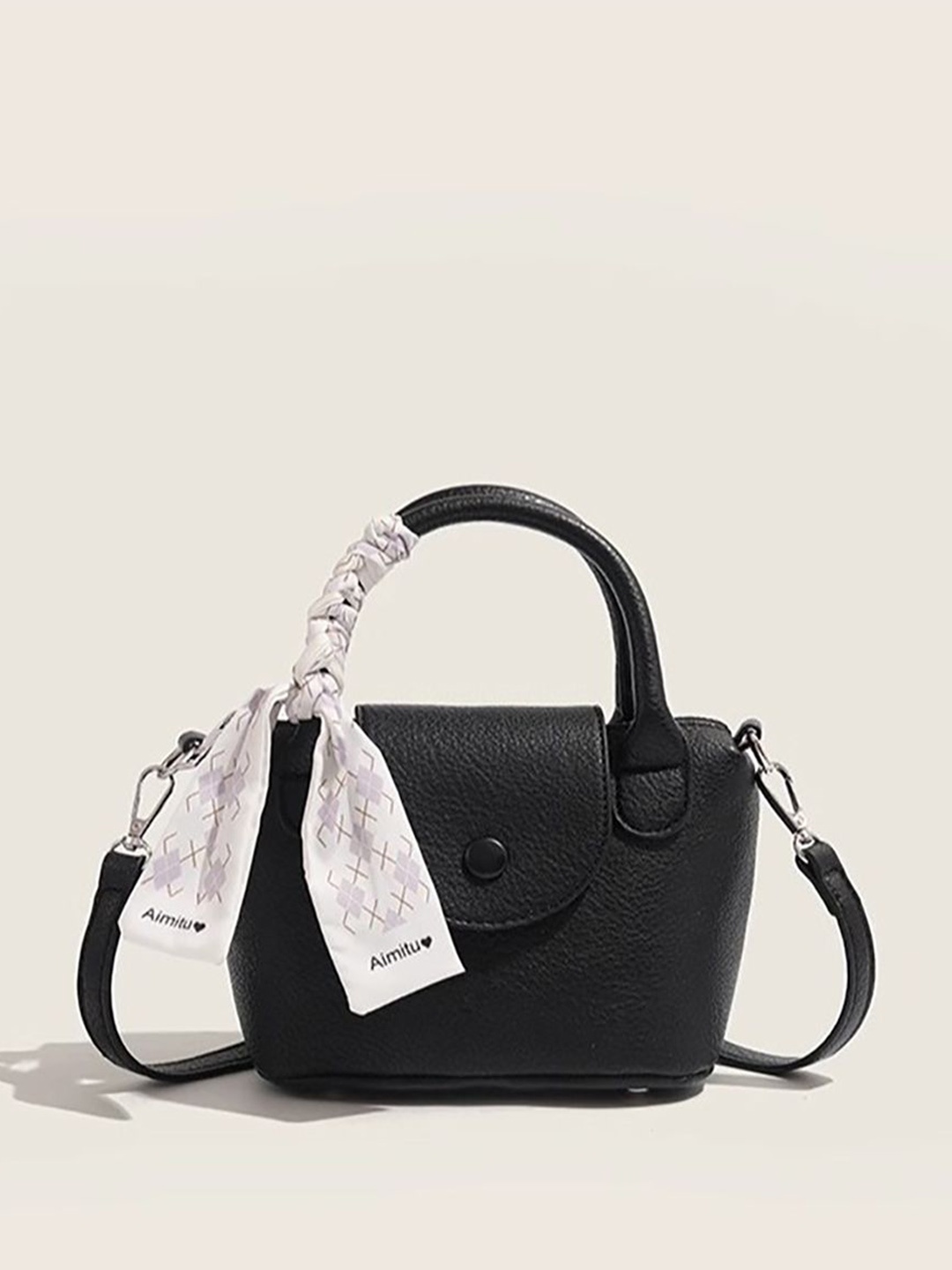 

StyleCast x Revolte Swagger Sling Bag, Black