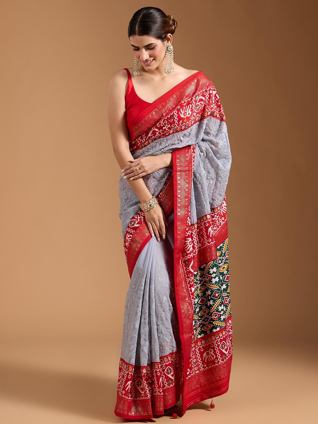 

Jinal & Jinal Ethnic Motifs Chikankari Pure Georgette Designer Patola Saree, Grey