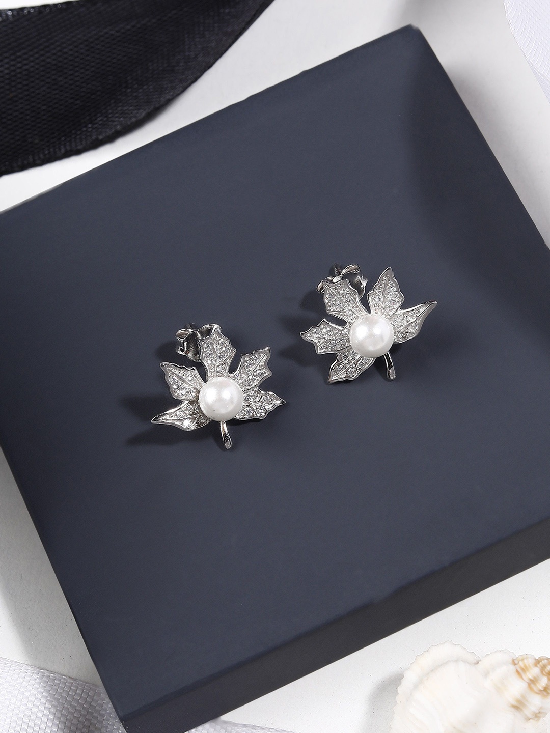 

DIAVO Women Rhodium Plated Silver Toned Leaf Shape Studs Earrings