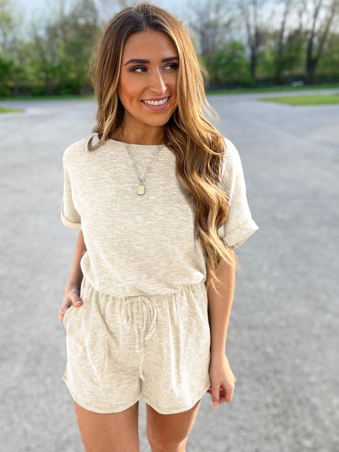 

StyleCast Women Round Neck Solid Playsuit, Beige