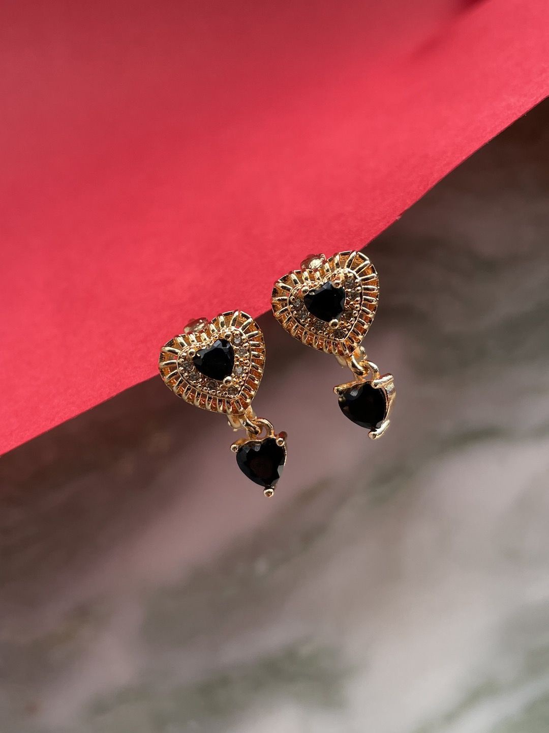 

Digital Dress Room Gold-Plated Black AD-Studded Heart-Shaped Drop Earrings