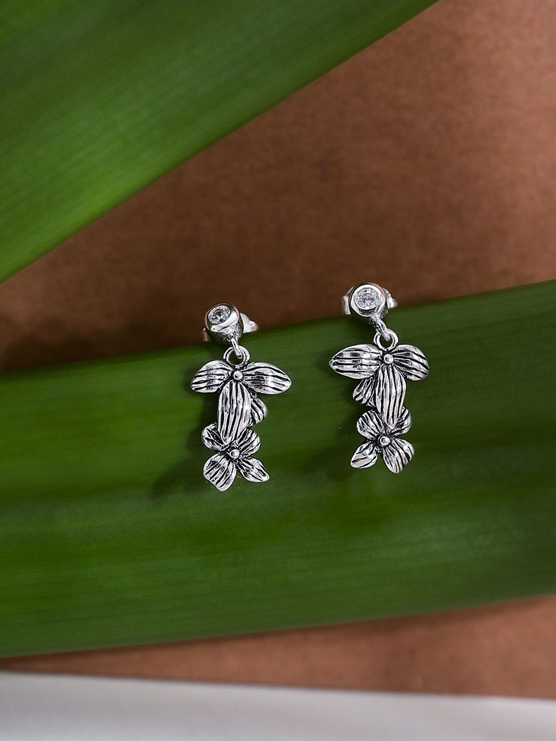 

DIAVO Women Rhodium Platted Silver Toned Floral Drop Earrings