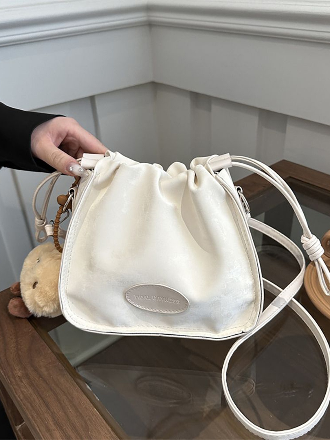 

StyleCast x Revolte Swagger Sling Bag with Applique, White