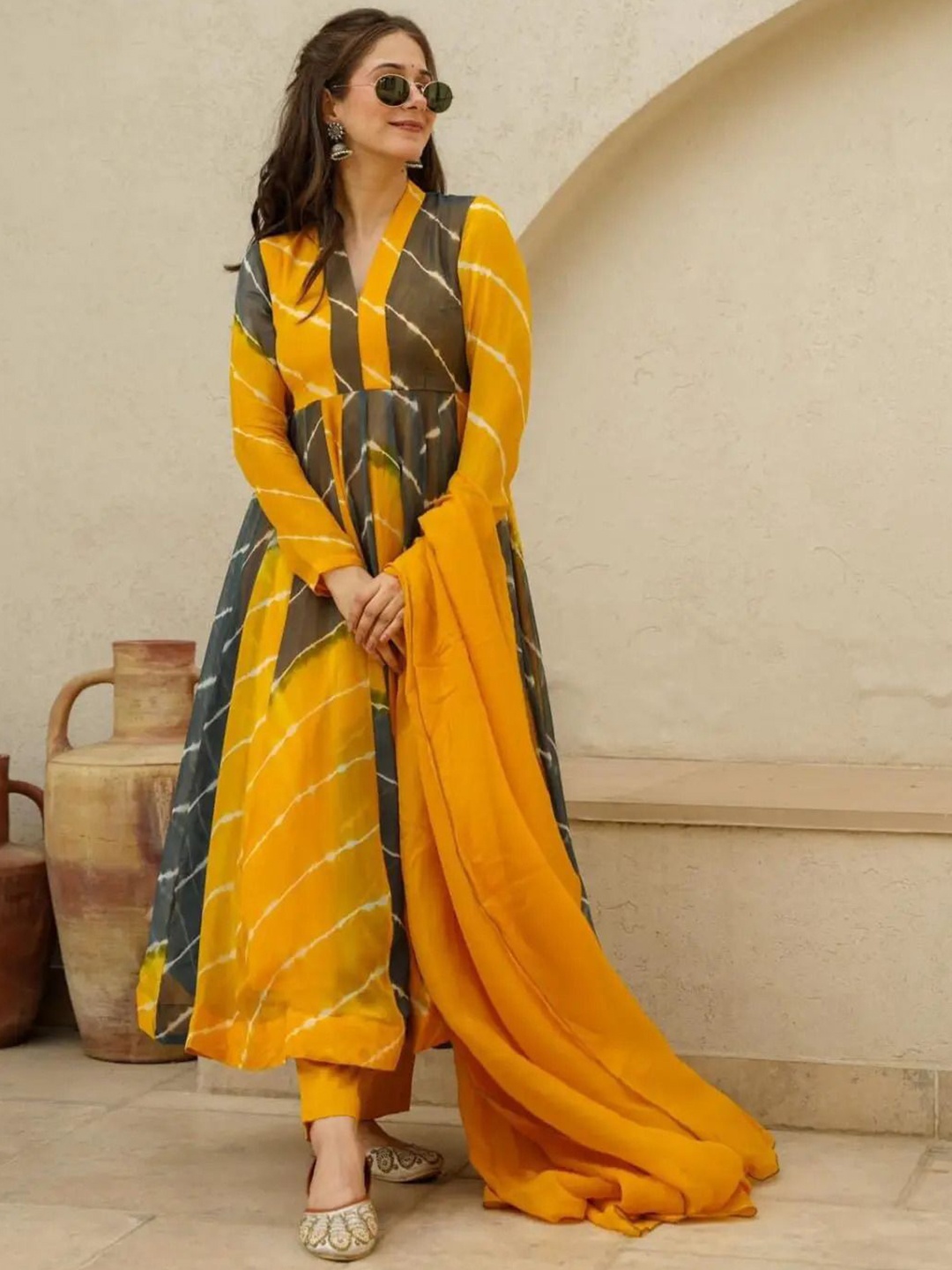 

Jayalakshmi Silks Women Leheriya Printed Regular Kurta with Trousers & With Dupatta, Yellow