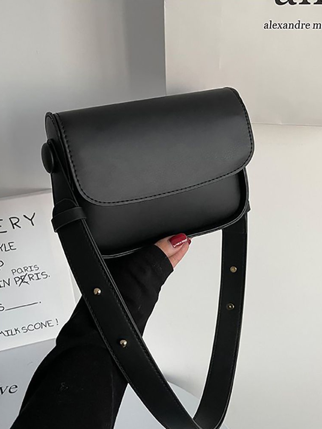 

StyleCast x Revolte PU Swagger Sling Bag, Black