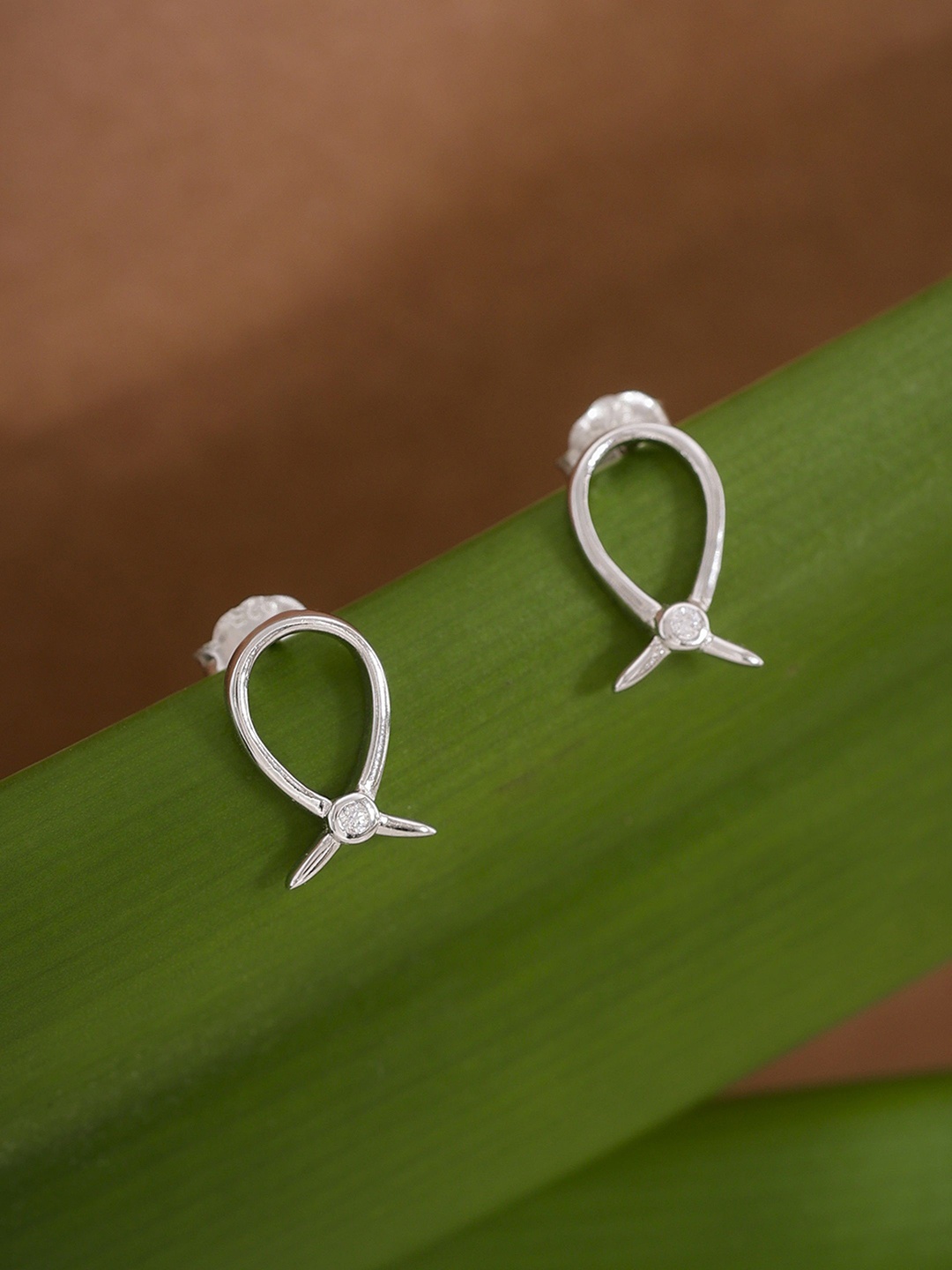 

DIAVO Women Rhodium Plated Silver Toned Studs Earrings