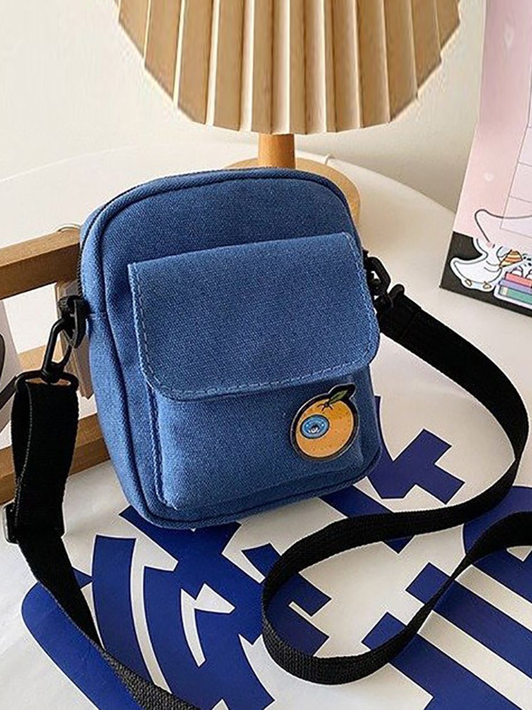 

StyleCast x Revolte Sling Bag, Blue