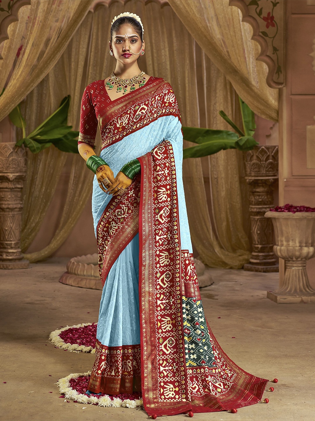 

Jinal & Jinal Ethnic Motifs Zari Pure Georgette Patola Saree, Blue