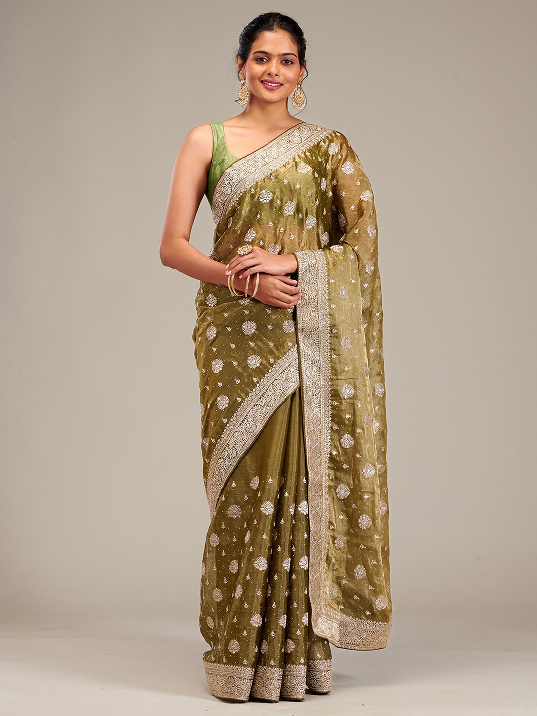 

Koskii Ethnic Motifs Beads and Stones Tissue Saree, Green