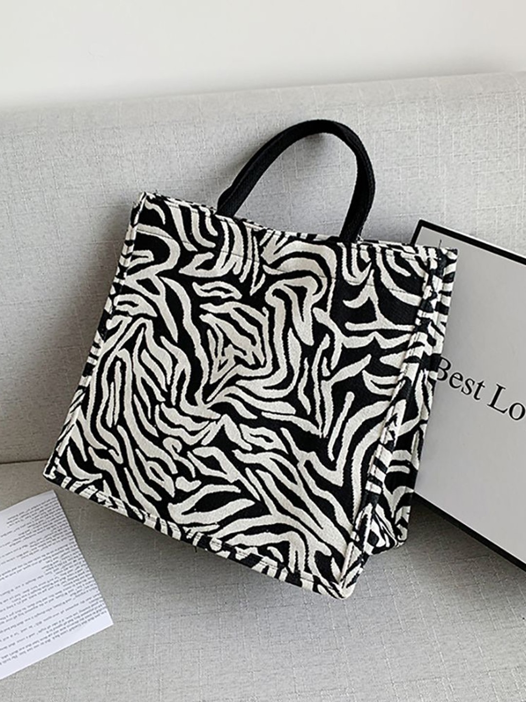 

StyleCast x Revolte Printed PU Bucket Handheld Bag, Black
