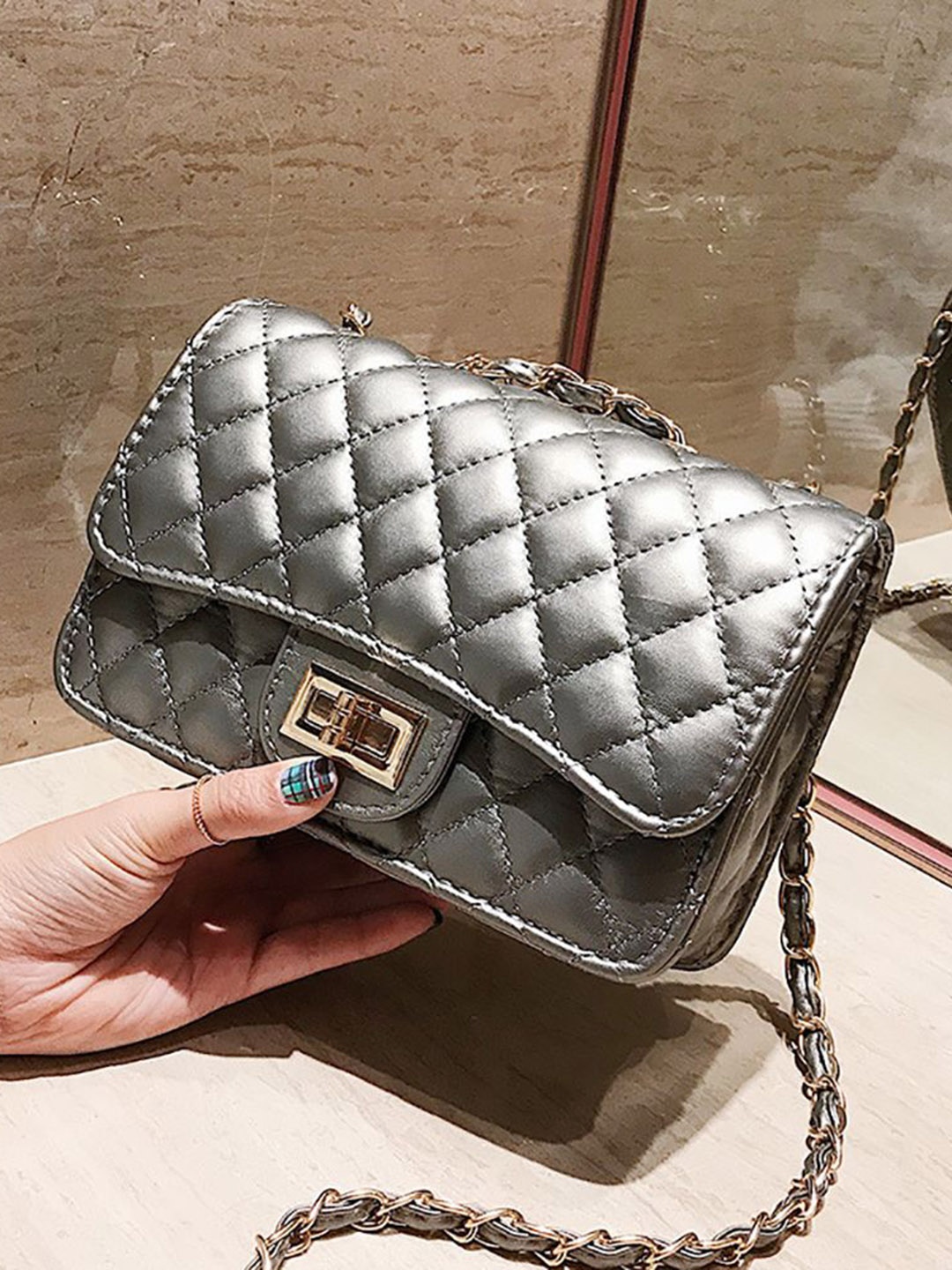 

StyleCast x Revolte PU Swagger Sling Bag, Silver