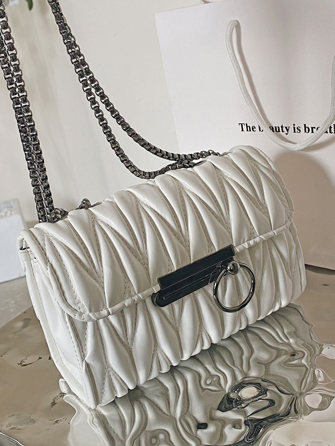 

StyleCast x Revolte PU Swagger Sling Bag, White