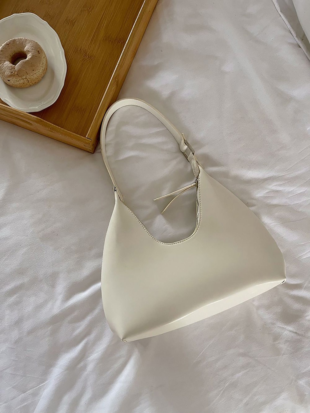 

StyleCast x Revolte Sling Bag, White