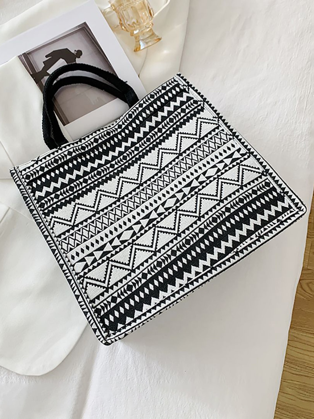 

StyleCast x Revolte Printed PU Bucket Handheld Bag, Black