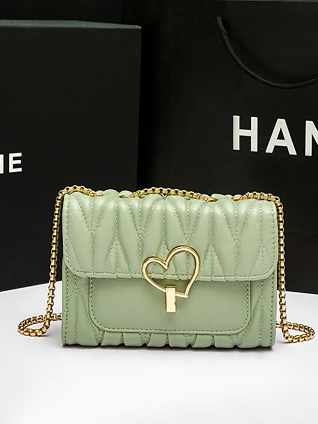 

StyleCast x Revolte PU Structured Sling Bag, Green