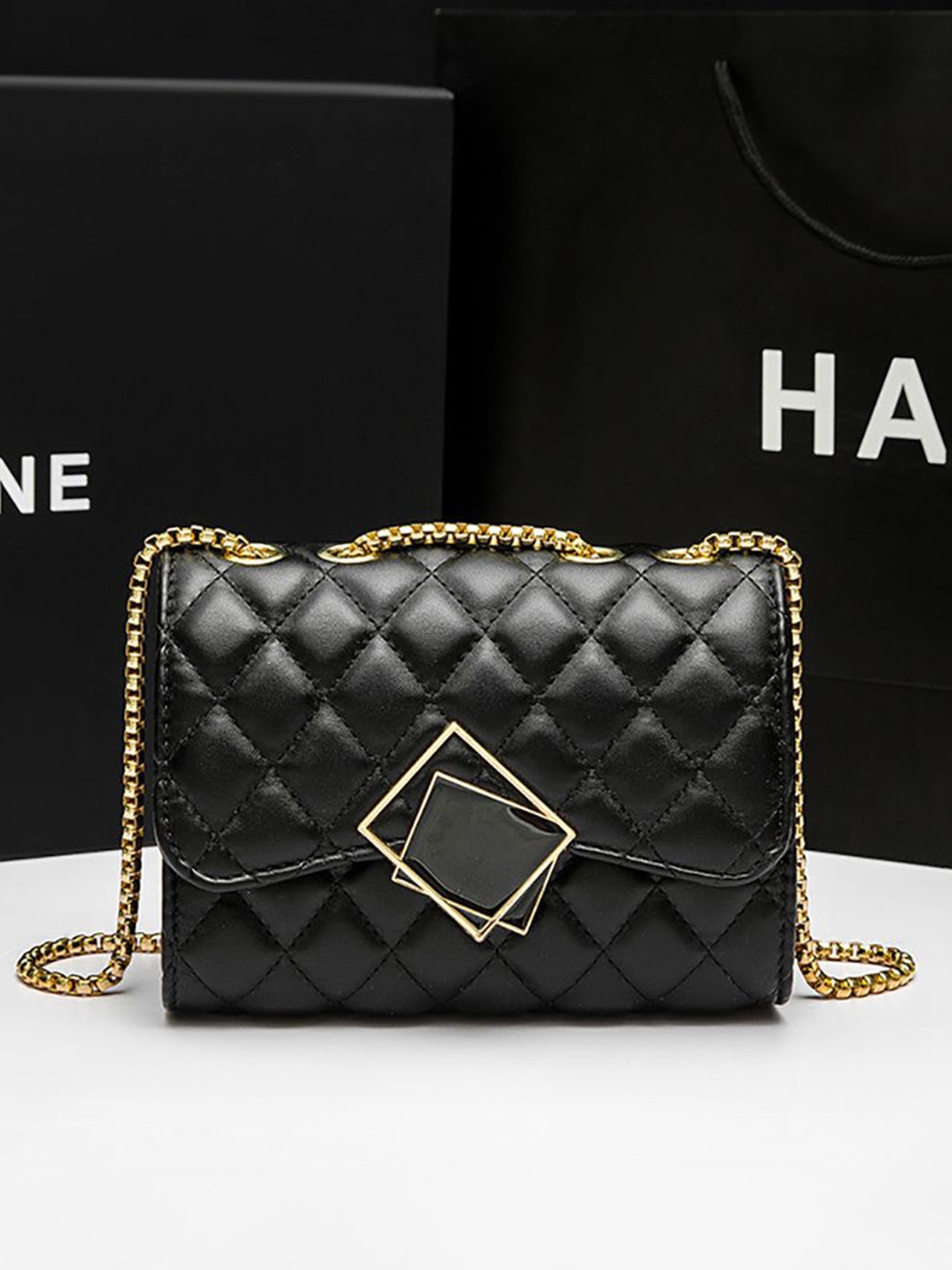 

StyleCast x Revolte PU Swagger Sling Bag, Black