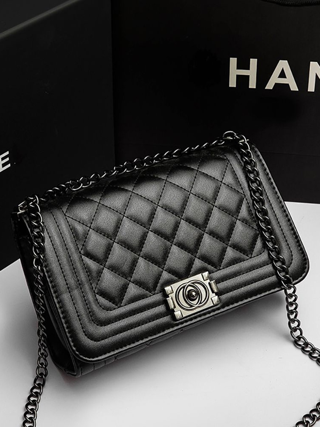

StyleCast x Revolte PU Swagger Sling Bag, Black