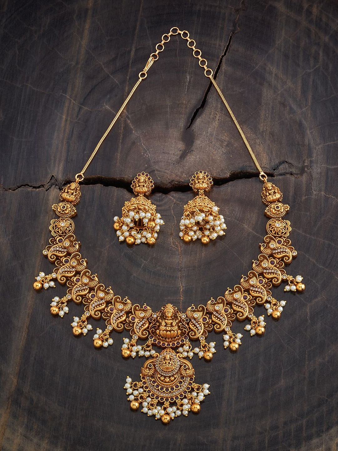 

Kushal's Fashion Jewellery Gold Plated Stone Studded & Beaded Antique Necklace & Earrings