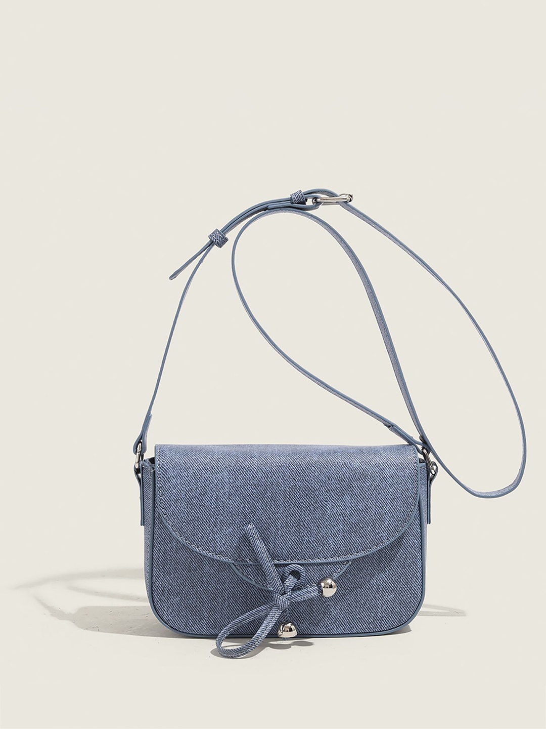 

StyleCast x Revolte Swagger Sling Bag, Blue
