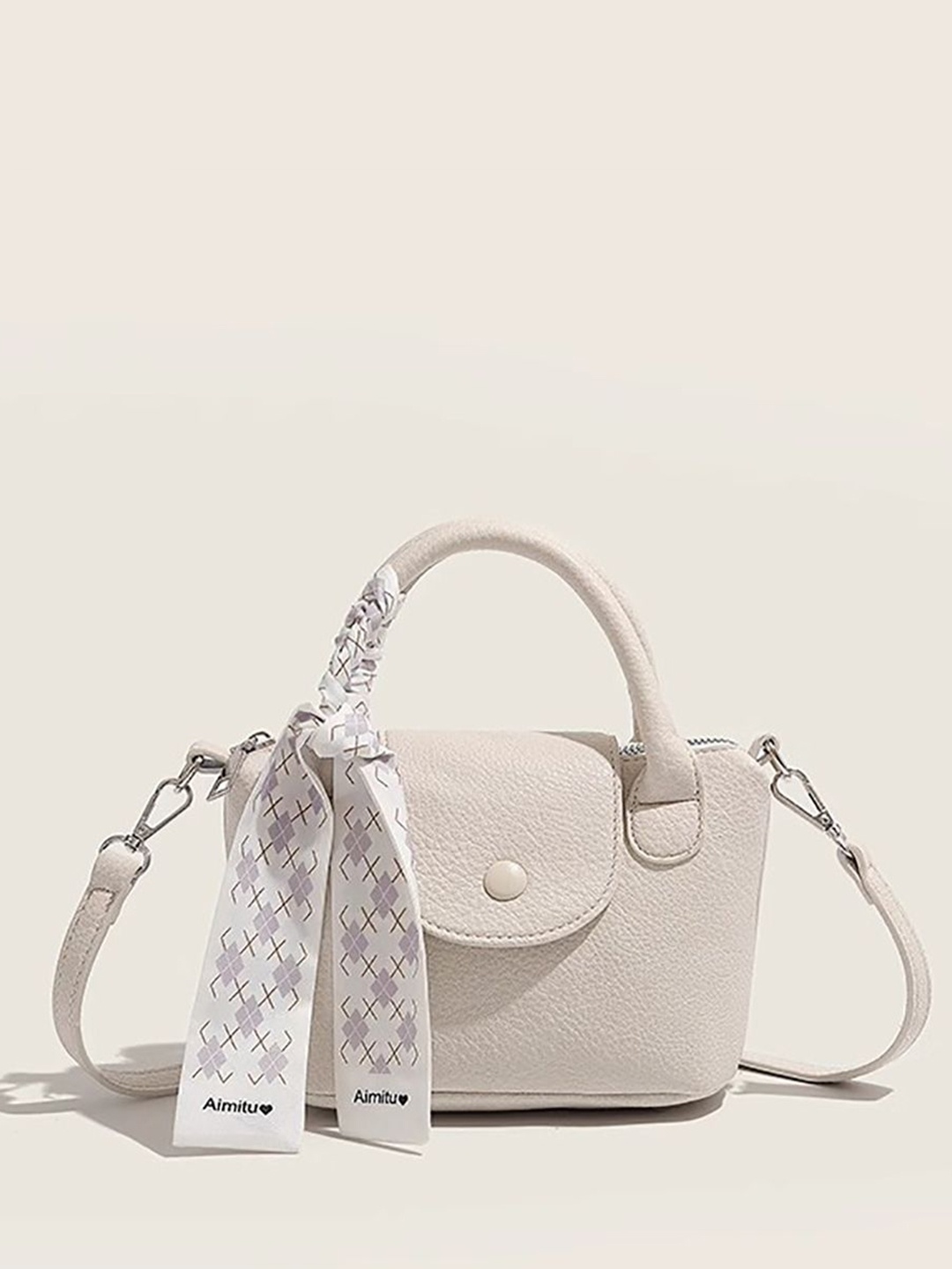 

StyleCast x Revolte Swagger Sling Bag, White