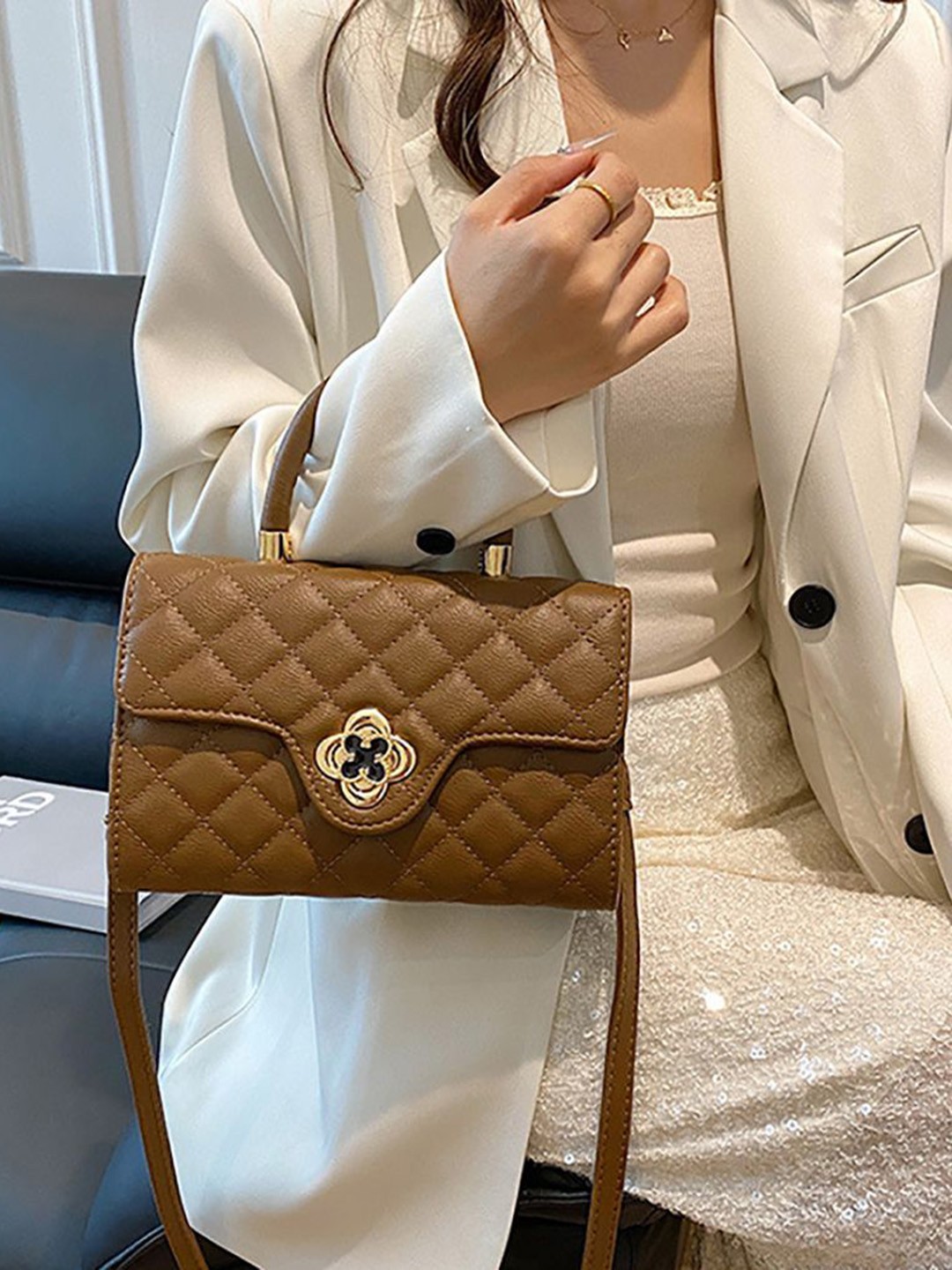 

StyleCast x Revolte PU Swagger Sling Bag, Brown