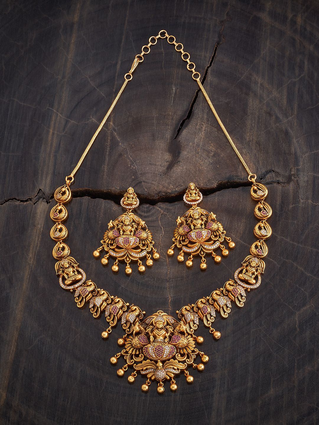 

Kushal's Fashion Jewellery Gold-Plated Stone Studded & Beaded Antique Necklace & Earrings