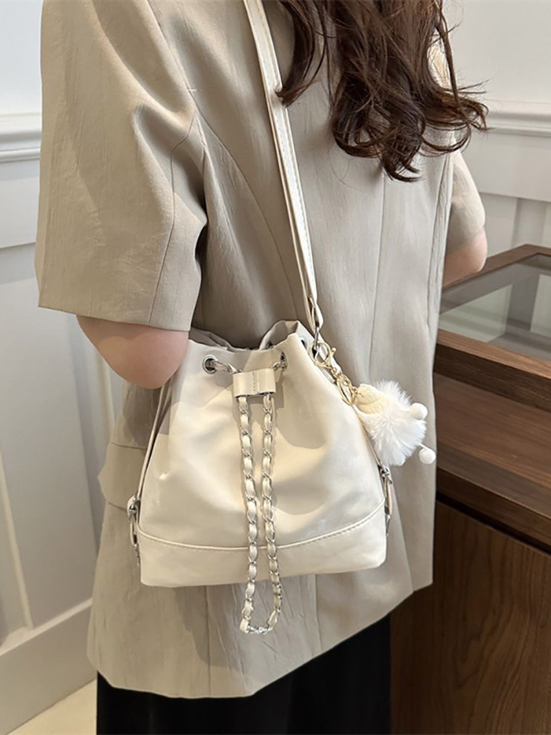 

StyleCast x Revolte PU Swagger Sling Bag, White