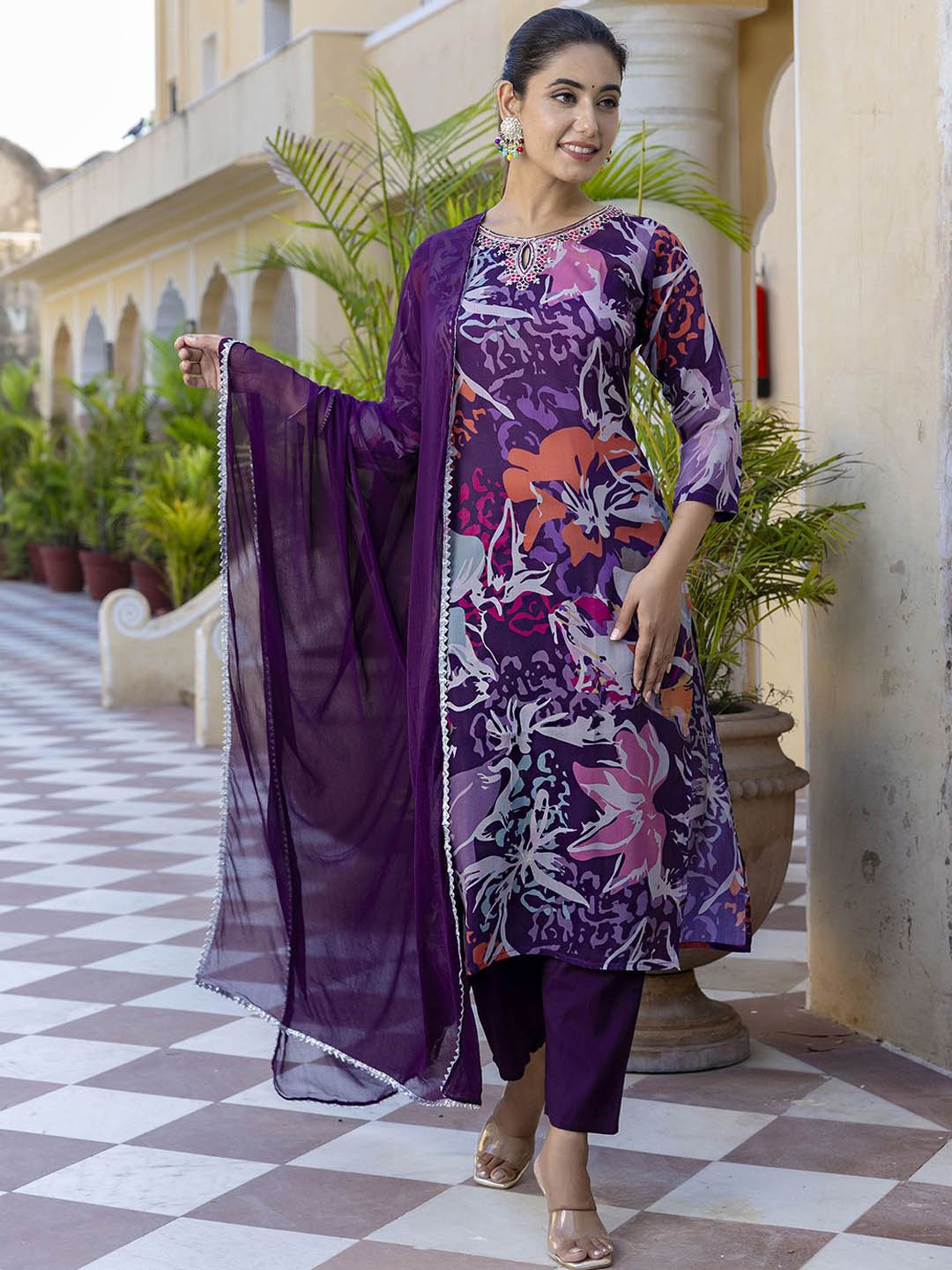 

Navlik Women Floral Printed Regular Thread Work Kurta with Trousers & With Dupatta, Purple