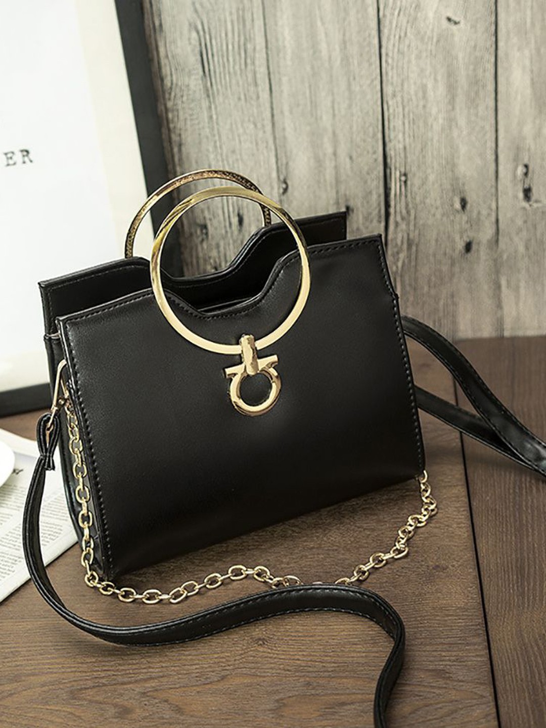 

StyleCast x Revolte PU Swagger Handheld Bag, Black