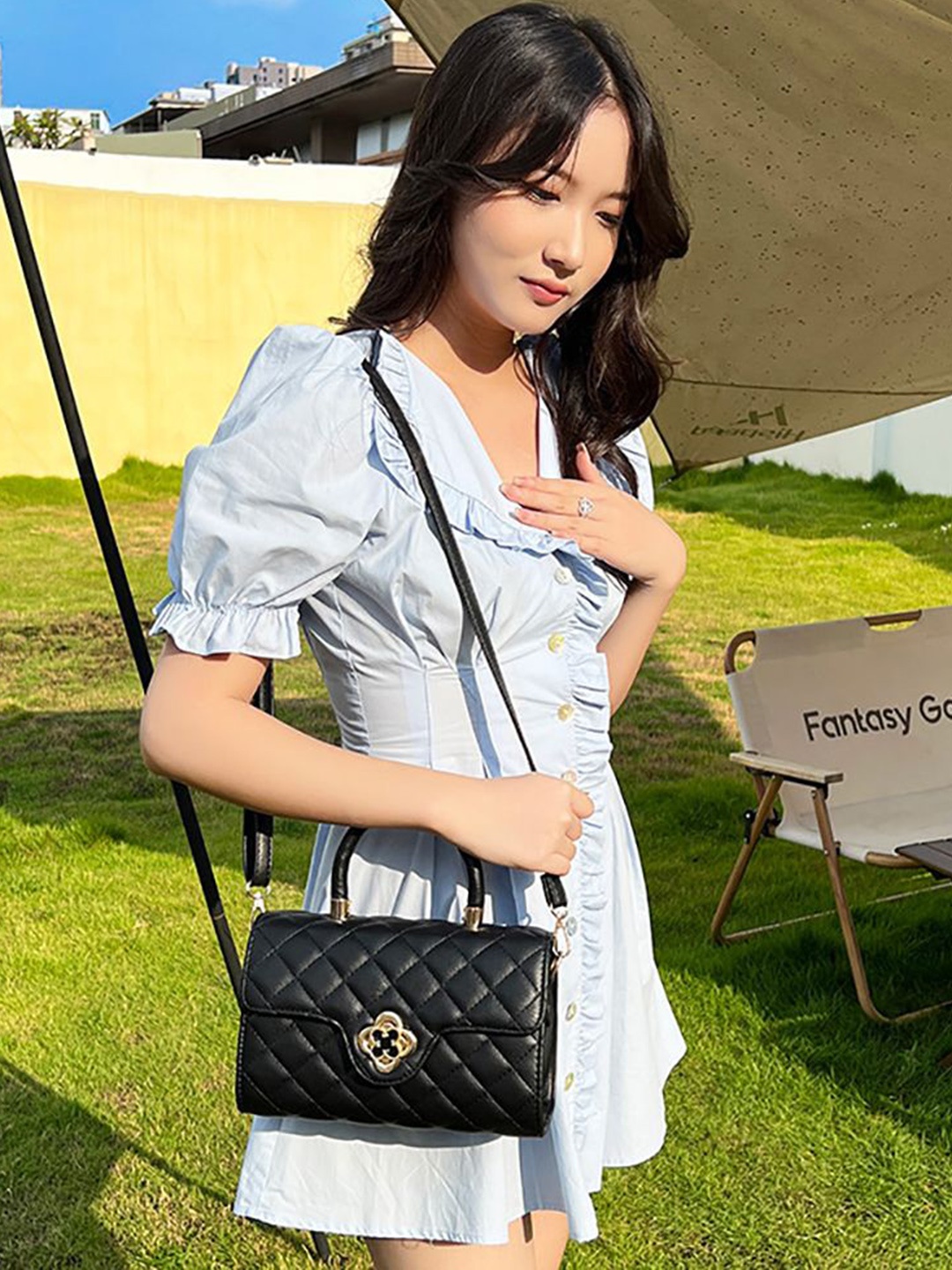 

StyleCast x Revolte PU Swagger Sling Bag, Black