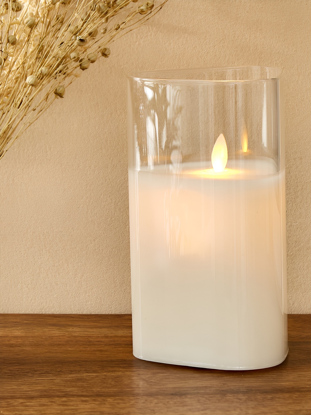 

Home Centre Transparent & White Glass LED Candle Light