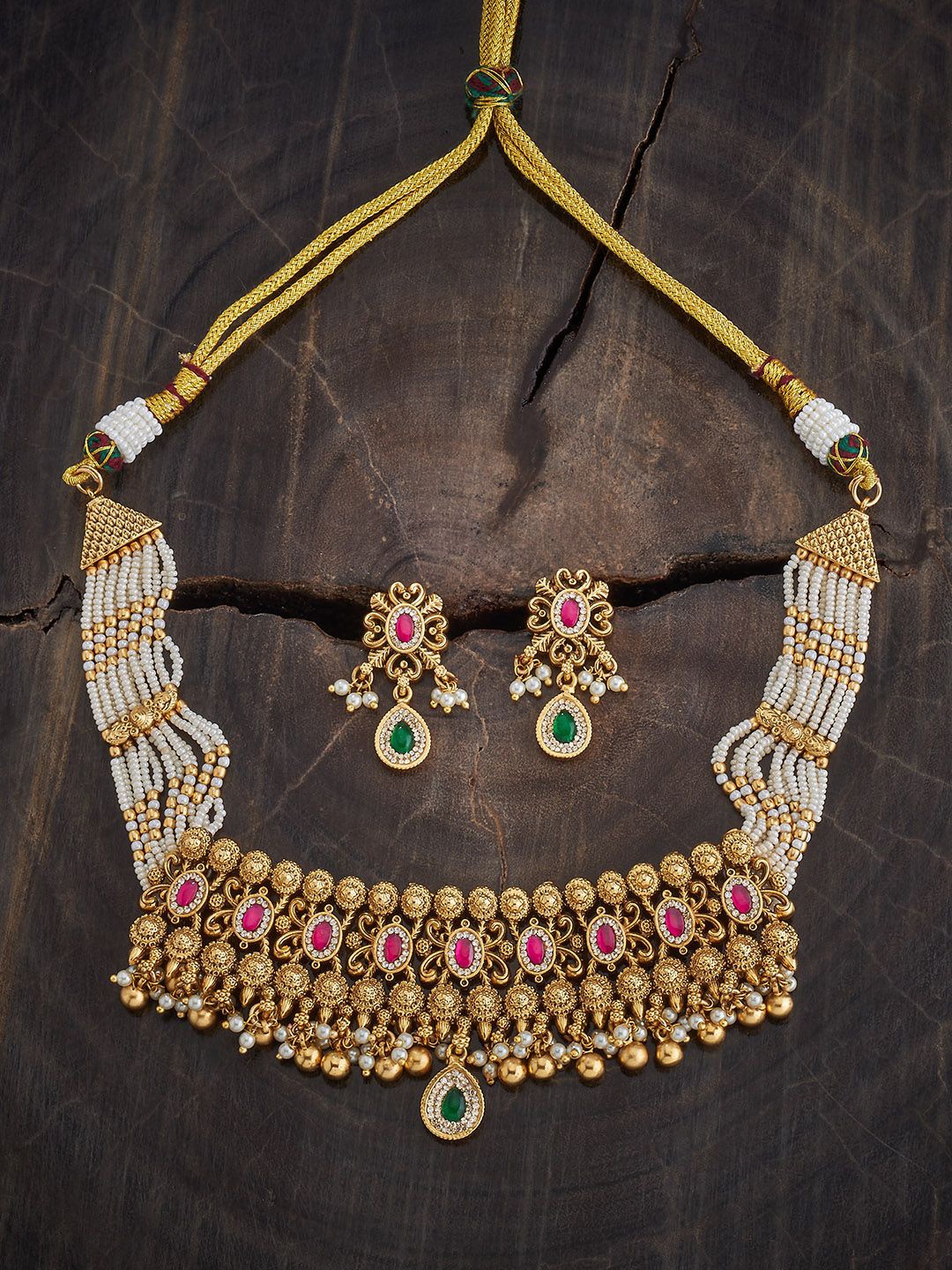 

Kushal's Fashion Jewellery Gold-Plated Ruby Stone Studded & Beaded Antique Jewellery Set