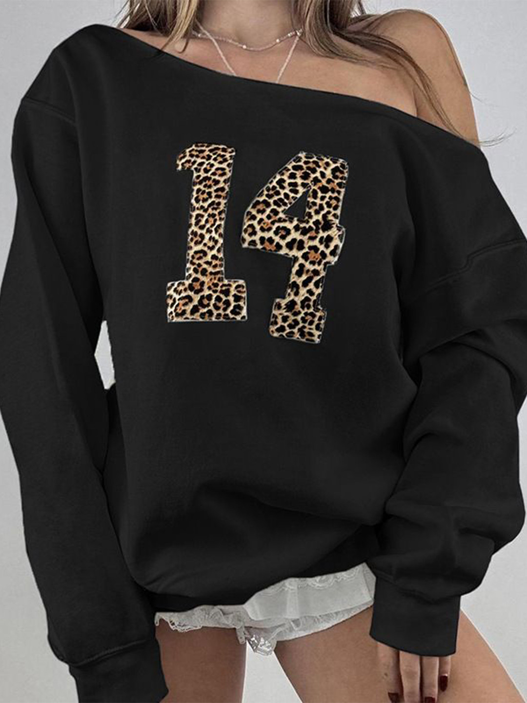 

StyleCast Women Animal Printed Long Sleeves Top, Black