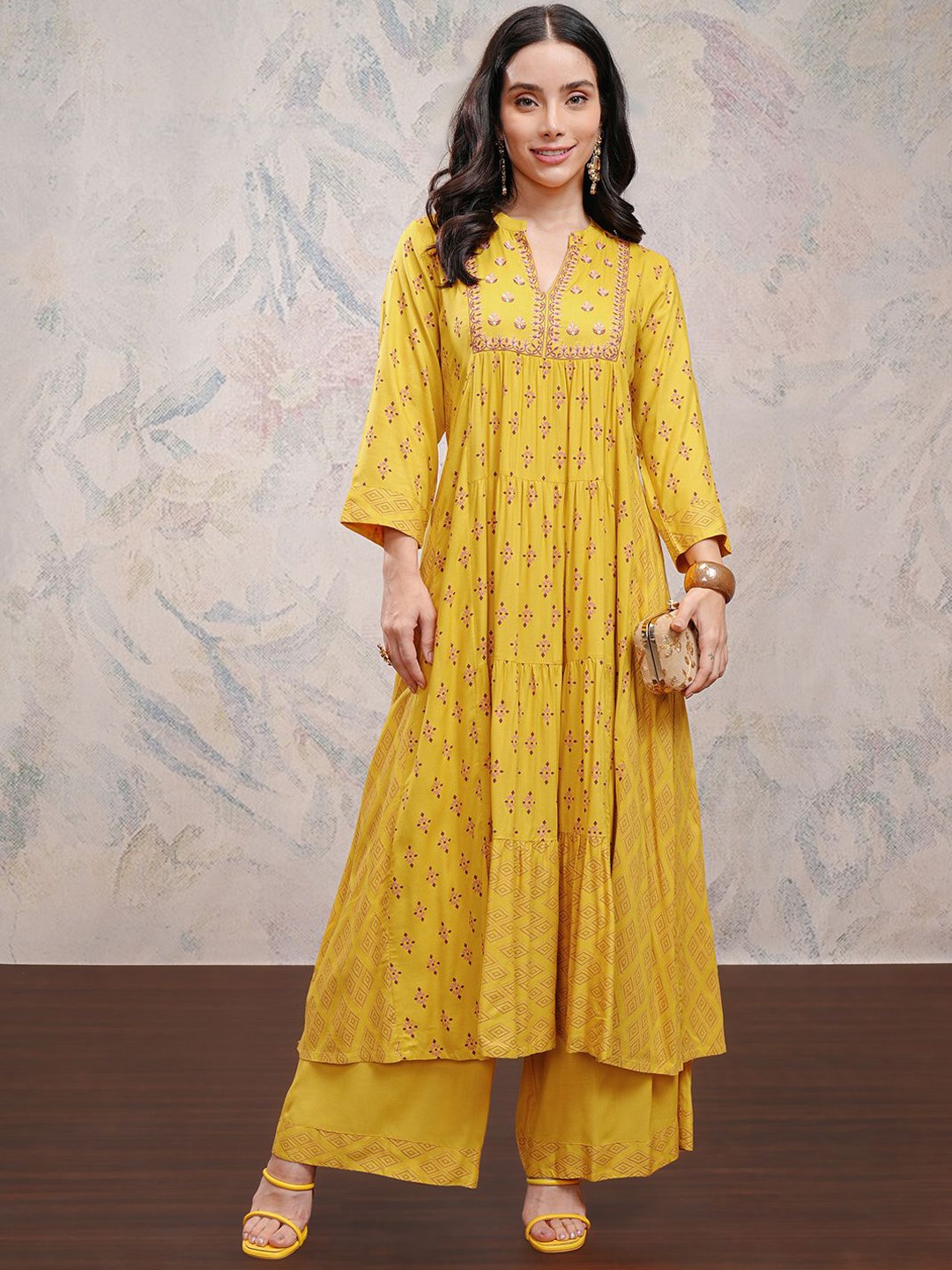 

Vishudh Women Ethnic Motifs Embroidered Tiered Thread Work Kurta with Palazzos, Mustard