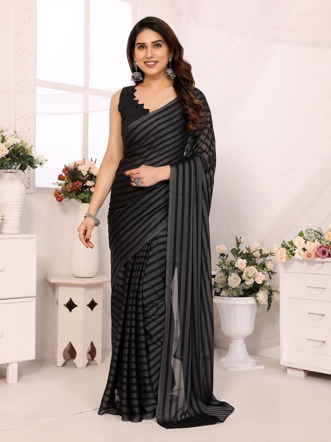 

BHARODIYA ENTERPRISES Striped Pure Georgette Ready to Wear Saree, Black