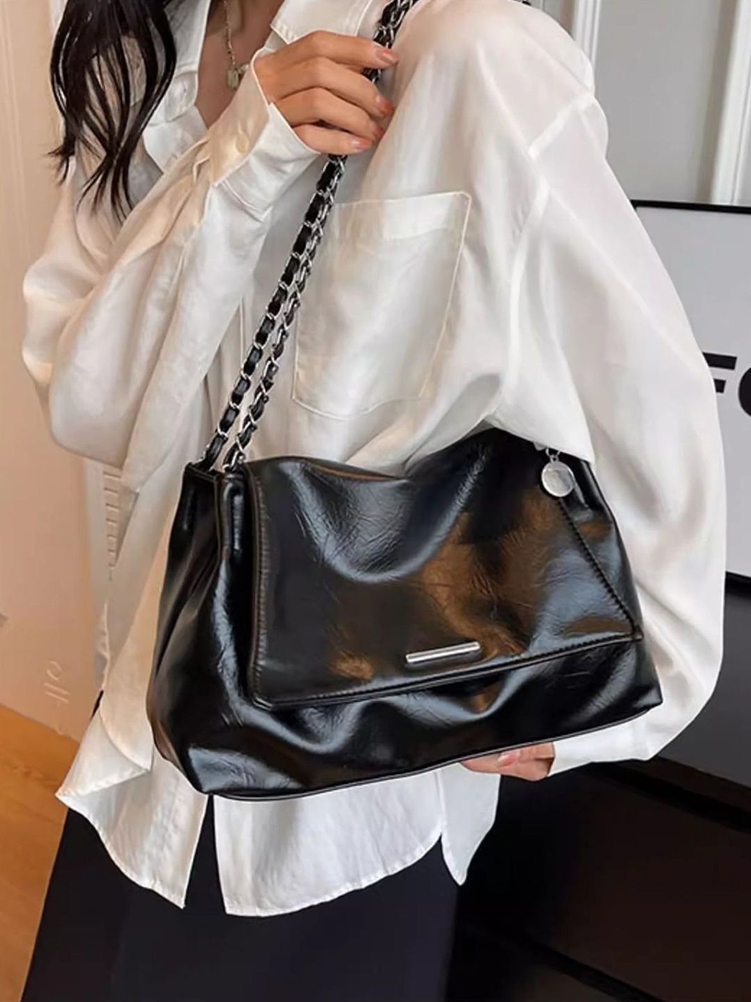 

StyleCast x Revolte PU Swagger Sling Bag with Tasselled, Black