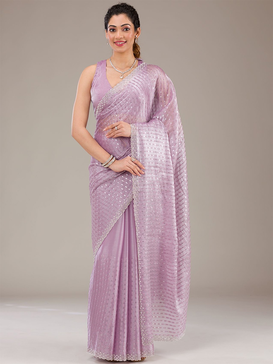 

Koskii Embellished Beads and Stones Pure Georgette Saree, Purple