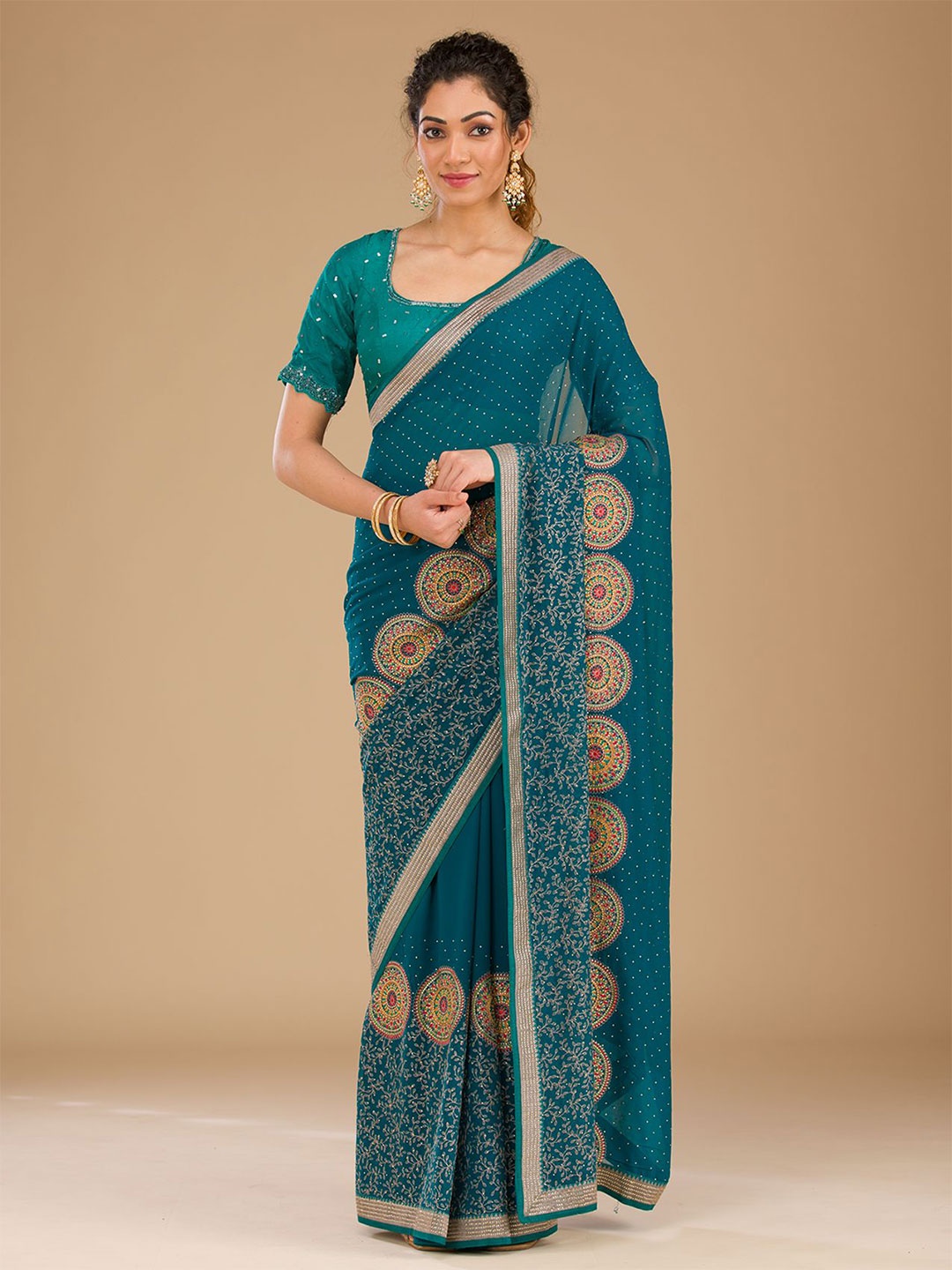 

Koskii Ethnic Motifs Embroidered Pure Georgette Saree, Blue