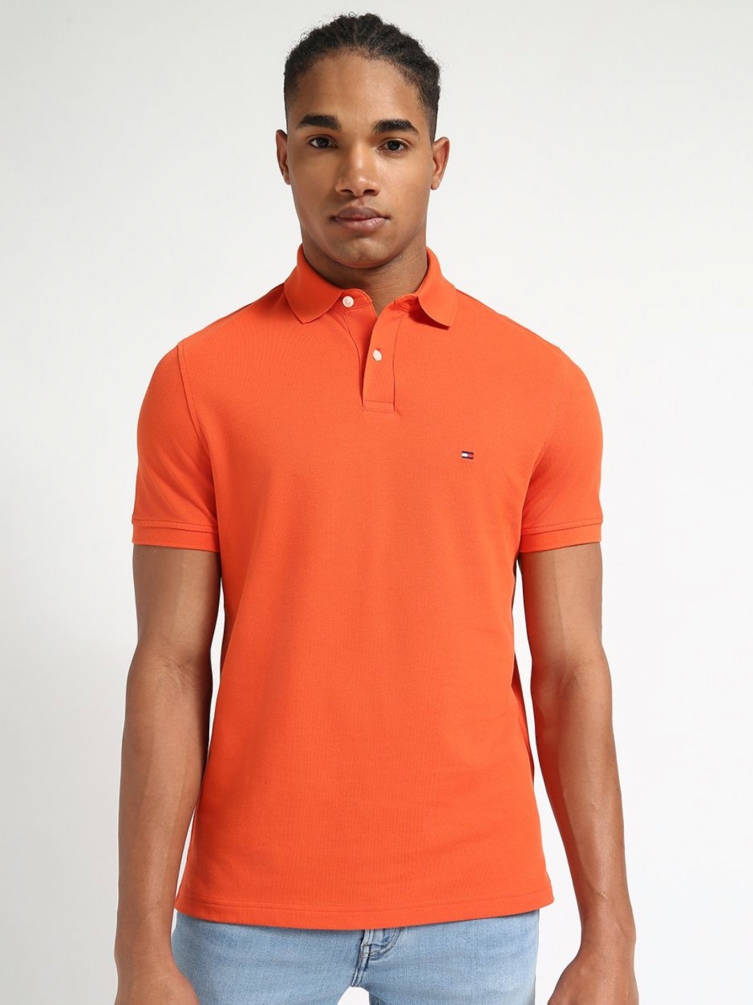 

Tommy Hilfiger Men Solid Polo Collar Cotton T-shirt, Orange