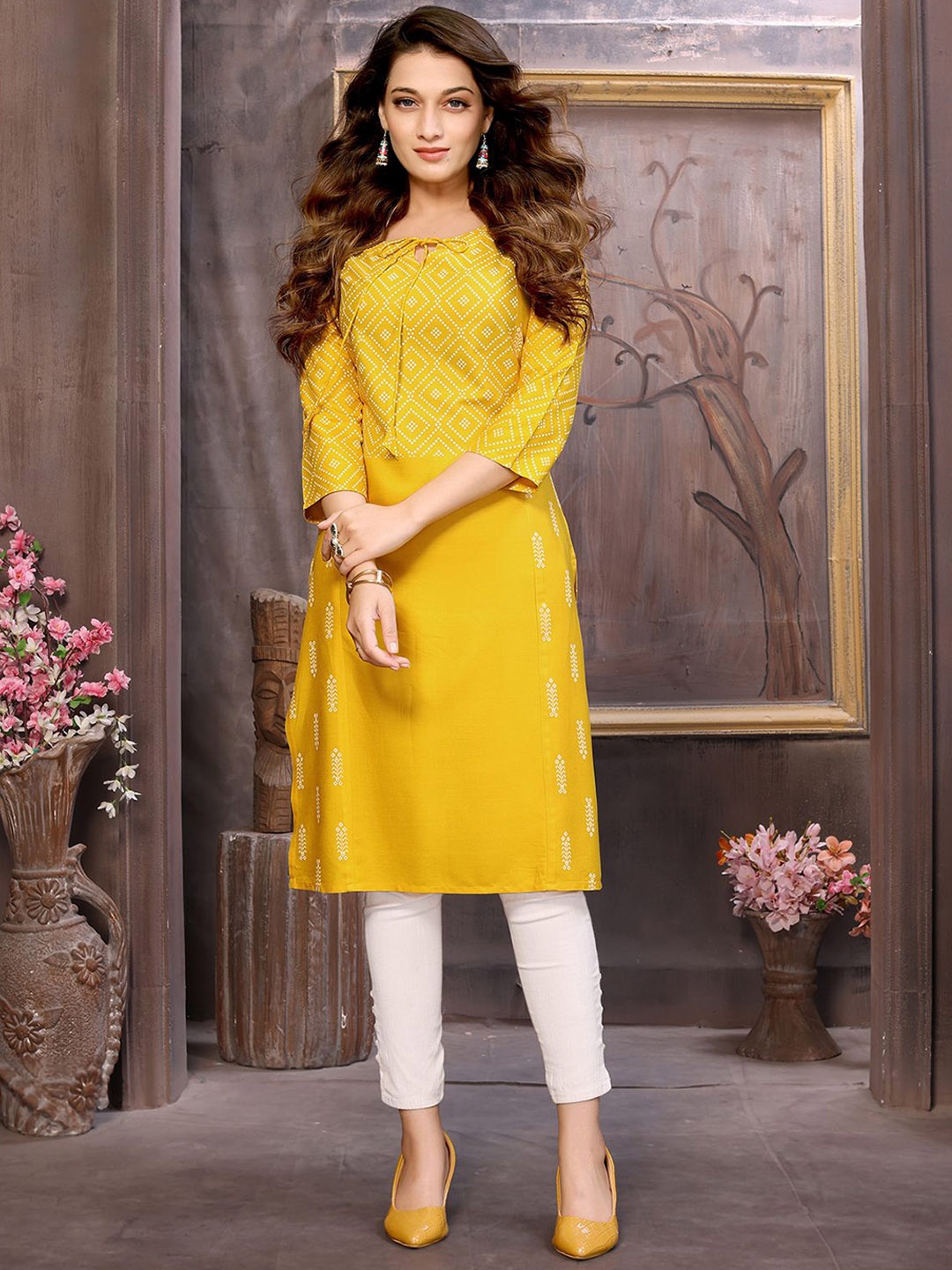 

Rangita Women Printed Keyhole Neck Kurta, Yellow