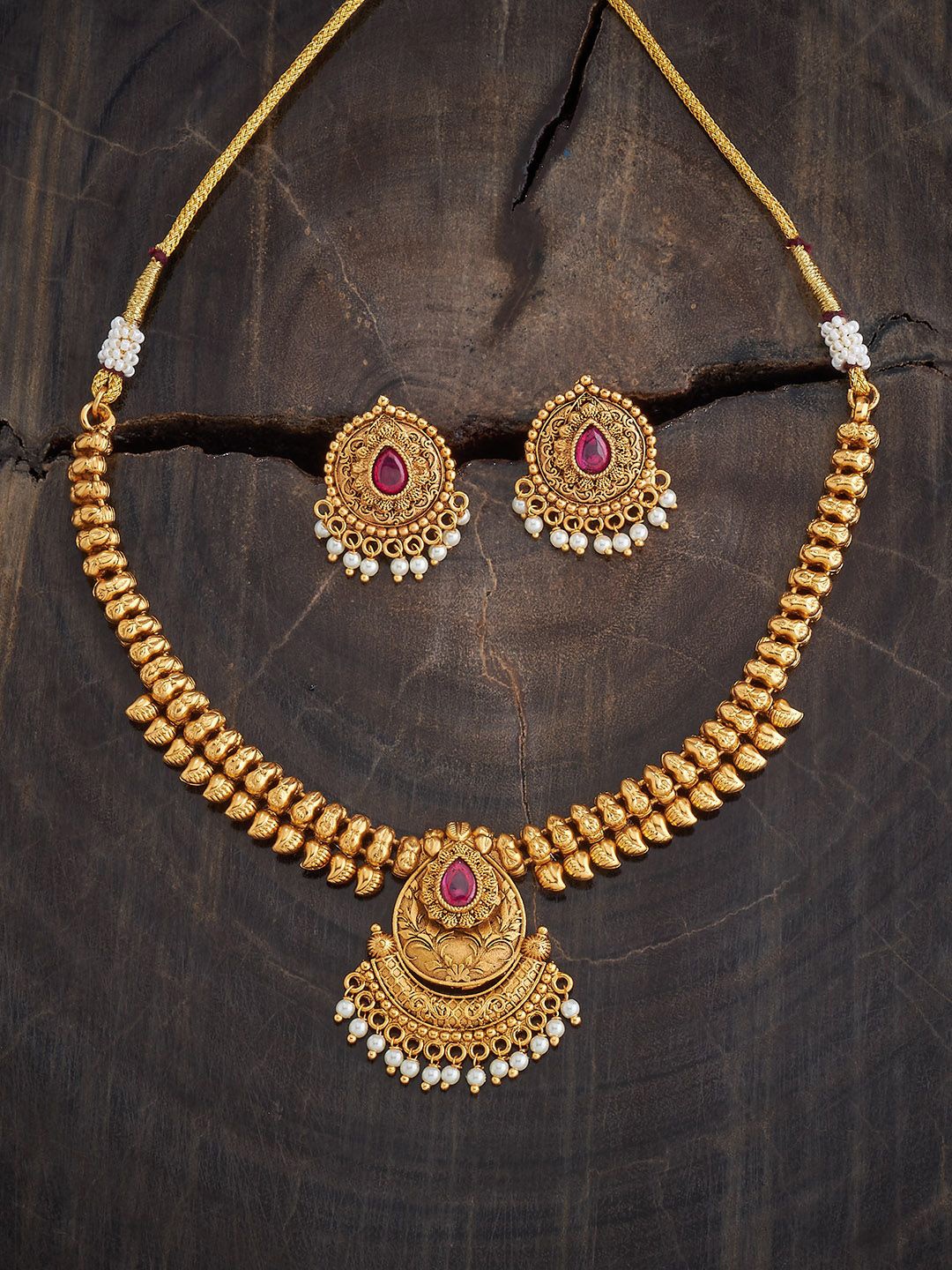 

Kushal's Fashion Jewellery Gold-Plated Ruby Stone Studded & Beaded Antique Jewellery Set