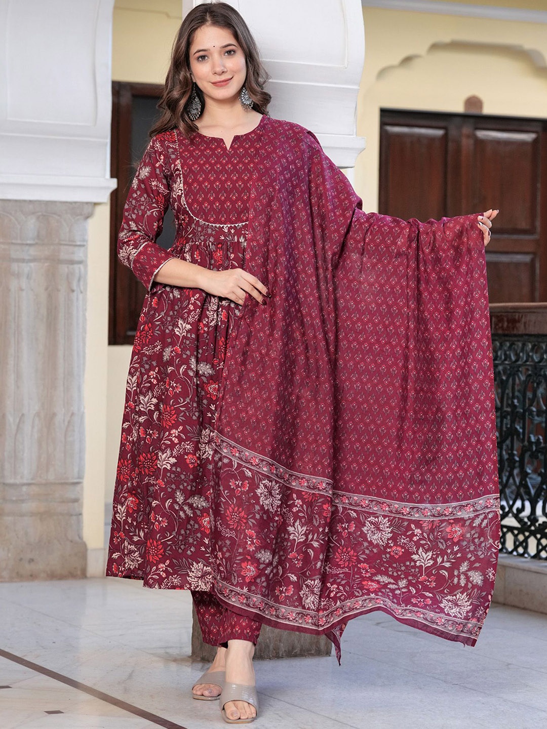 

Light Daisy Women Floral Printed Regular Kurta with Trousers & With Dupatta, Maroon