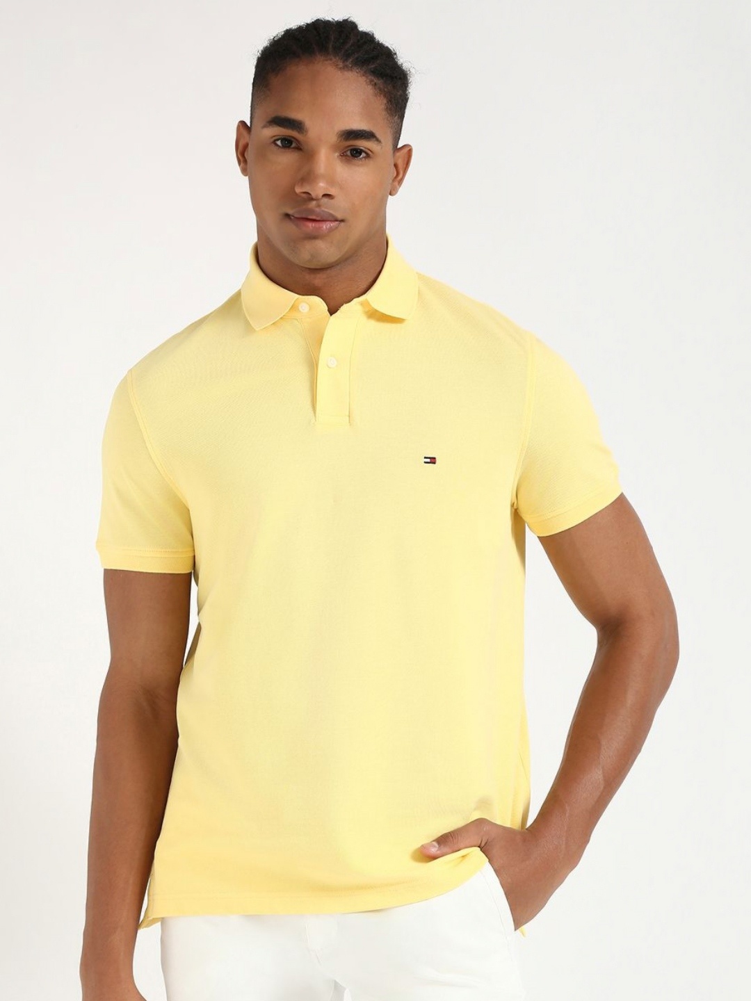 

Tommy Hilfiger Men Solid Polo Collar Cotton T-shirt, Yellow